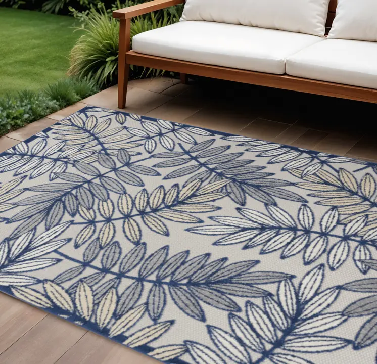 6' X 9' Ivory And Blue Floral Indoor Outdoor Area Rug
