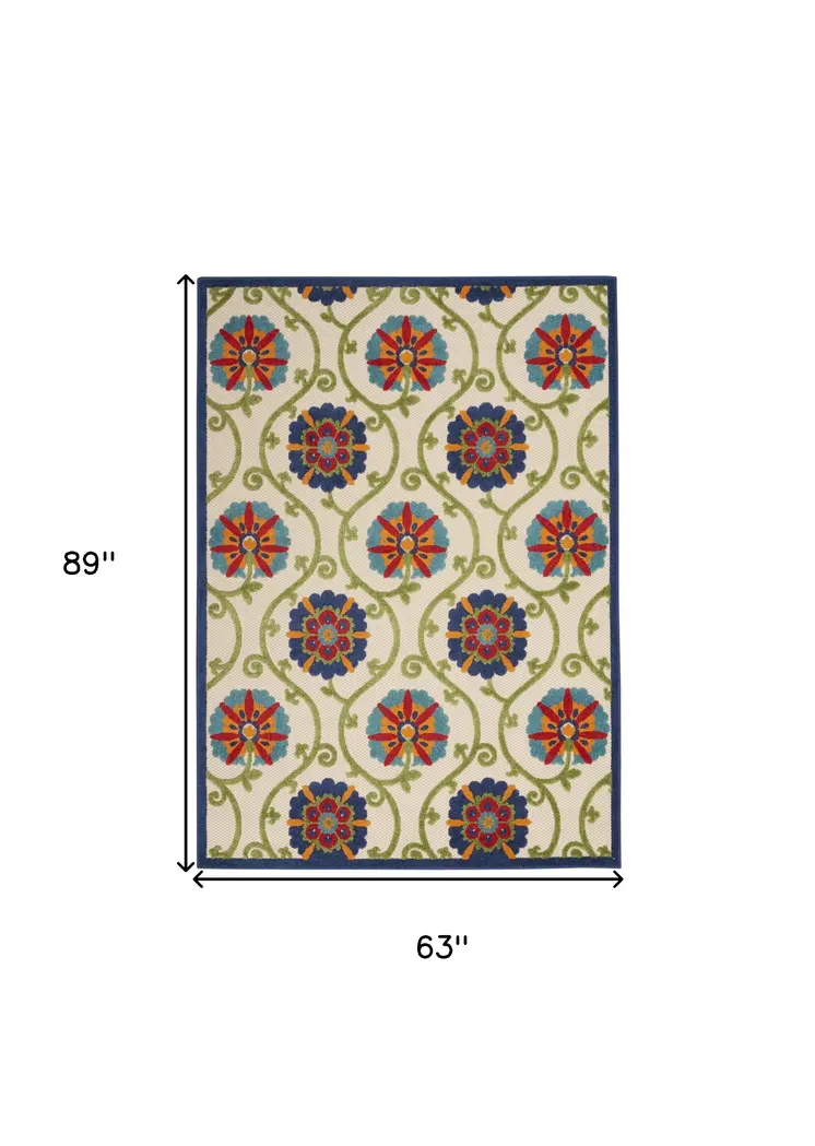 5' X 8' Ivory And Blue Floral Indoor Outdoor Area Rug