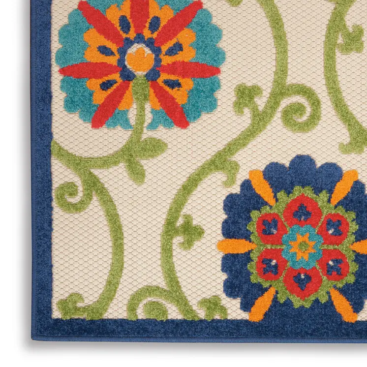 5' X 8' Ivory And Blue Floral Indoor Outdoor Area Rug
