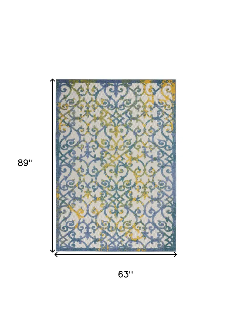 5' X 8' Ivory And Blue Indoor Outdoor Area Rug