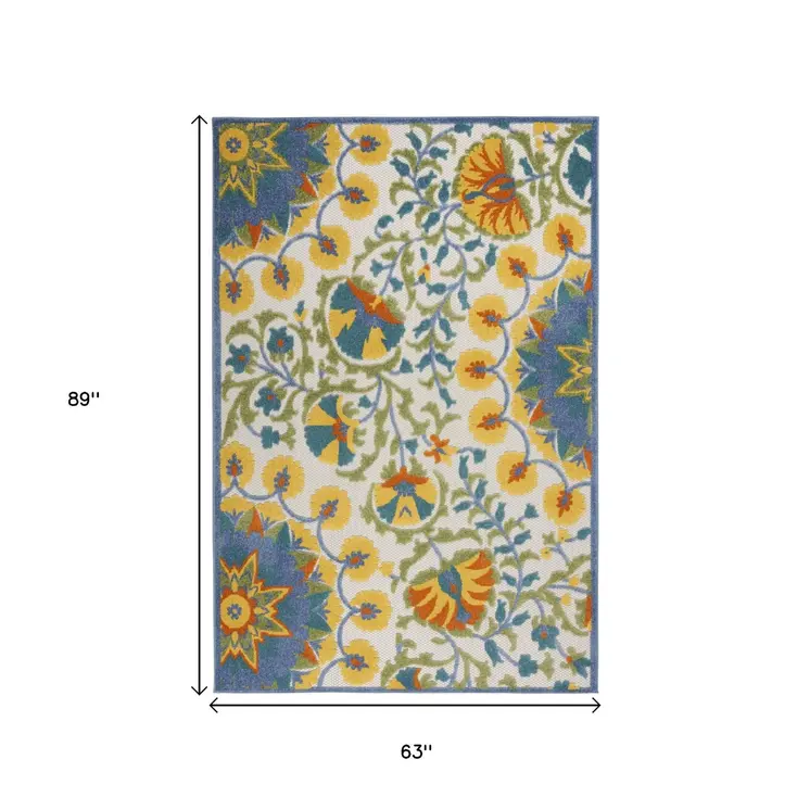 5' X 8' Ivory And Blue Floral Indoor Outdoor Area Rug