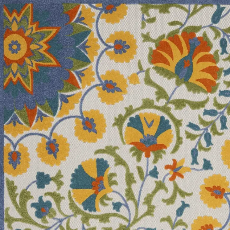 8' X 11' Ivory And Blue Floral Indoor Outdoor Area Rug