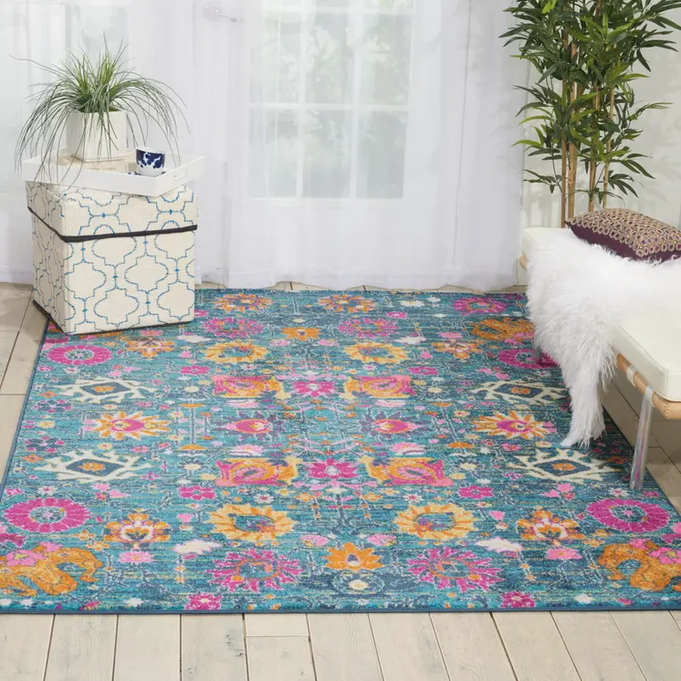 5' X 7' Blue And Orange Floral Distressed Area Rug