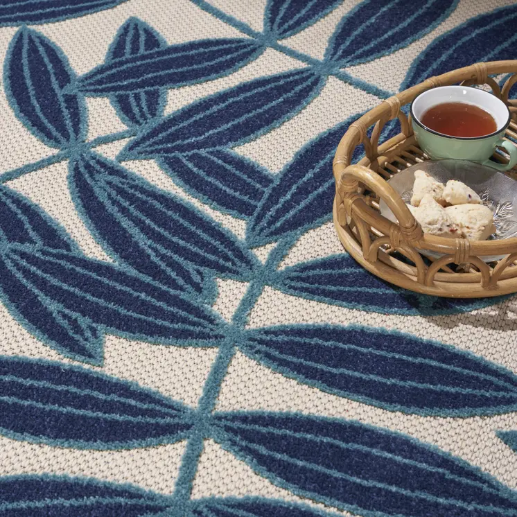 8' Blue And Ivory Round Floral Indoor Outdoor Area Rug