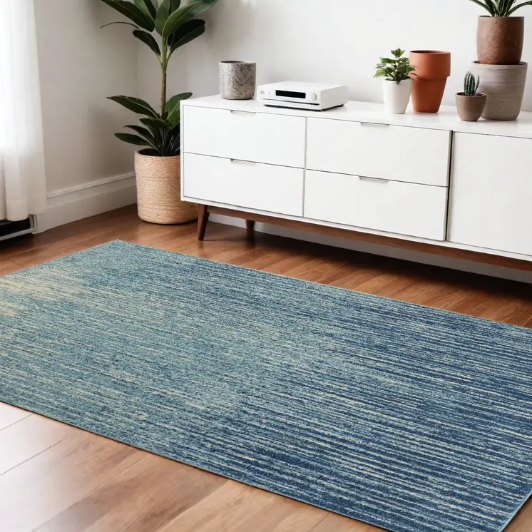 4' X 6' Blue And Ivory Abstract Area Rug