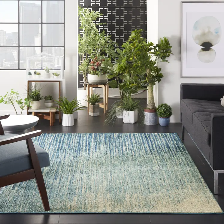 4' X 6' Blue And Ivory Abstract Area Rug