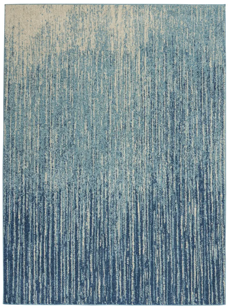 4' X 6' Blue And Ivory Abstract Area Rug