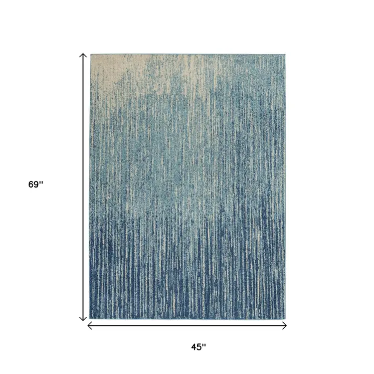 4' X 6' Blue And Ivory Abstract Area Rug