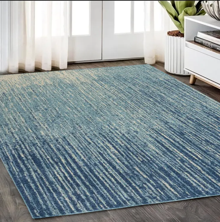 5' X 7' Blue And Ivory Abstract Area Rug