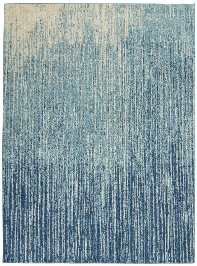 5' X 7' Blue And Ivory Abstract Area Rug