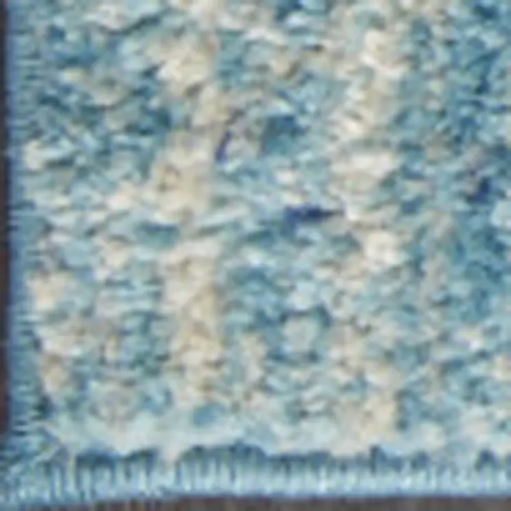 7' X 10' Blue And Ivory Abstract Area Rug