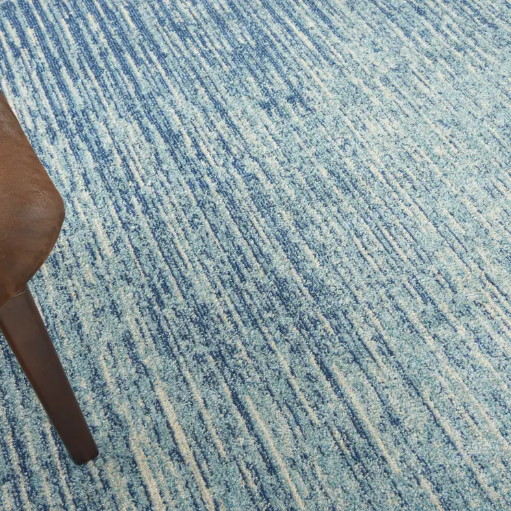 8' Blue And Ivory Abstract Round Rug