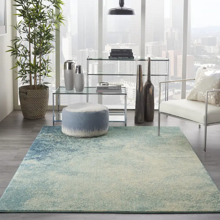 5' X 7' Blue And Ivory Abstract Area Rug