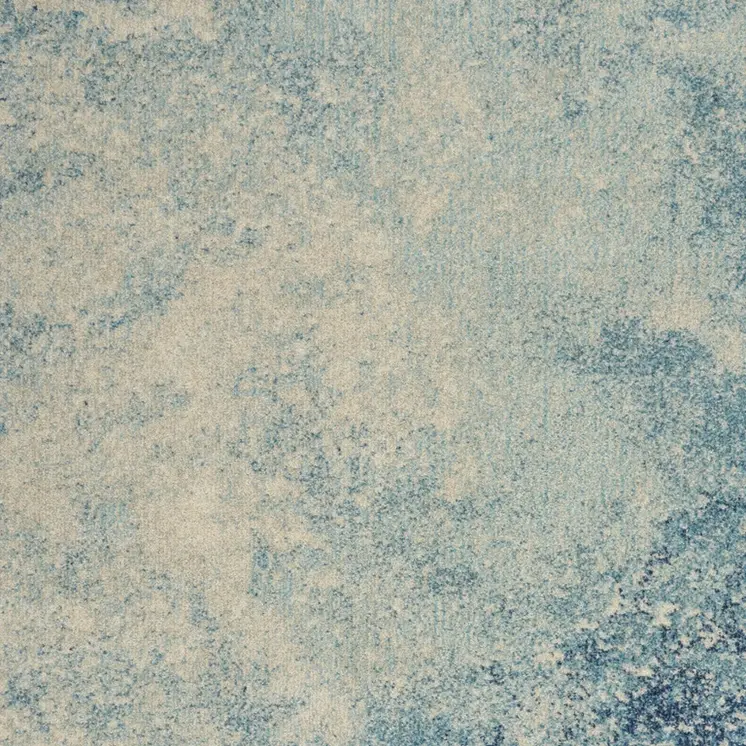 5' X 7' Blue And Ivory Abstract Area Rug