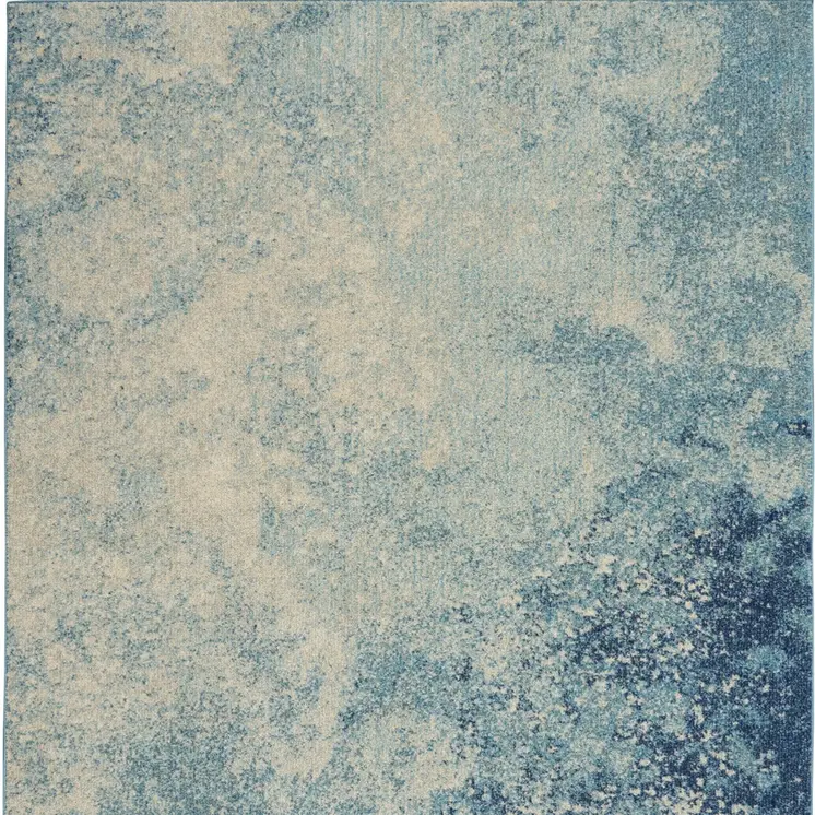 5' X 7' Blue And Ivory Abstract Area Rug