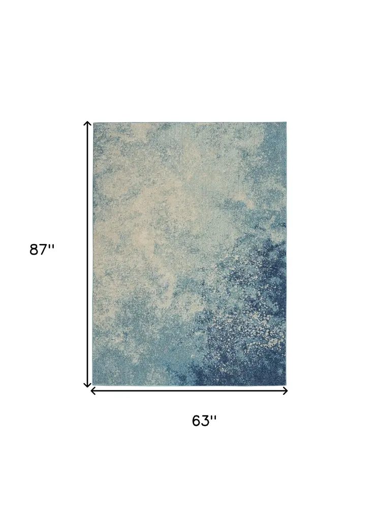 5' X 7' Blue And Ivory Abstract Area Rug