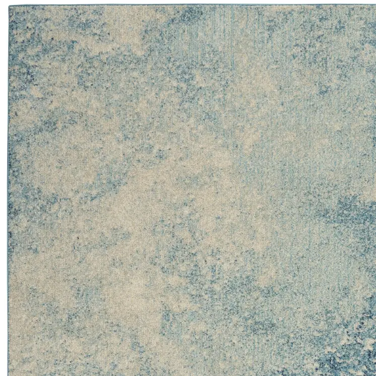 4' X 6' Blue And Ivory Abstract Area Rug