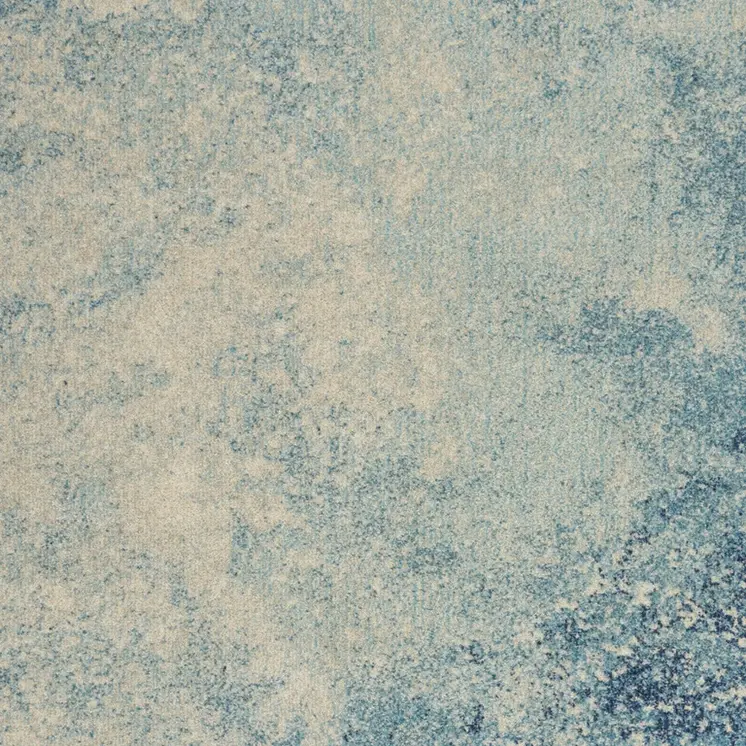 4' X 6' Blue And Ivory Abstract Area Rug