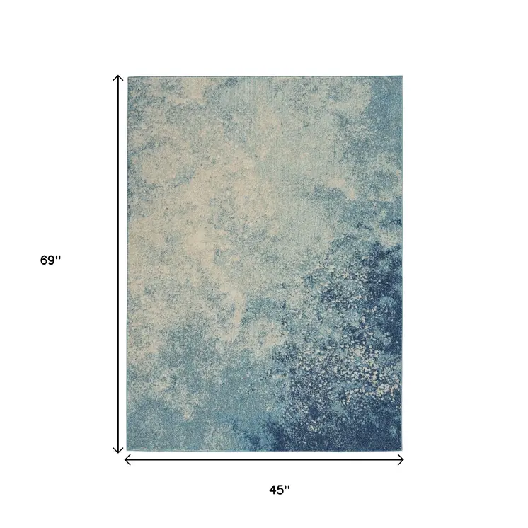 4' X 6' Blue And Ivory Abstract Area Rug