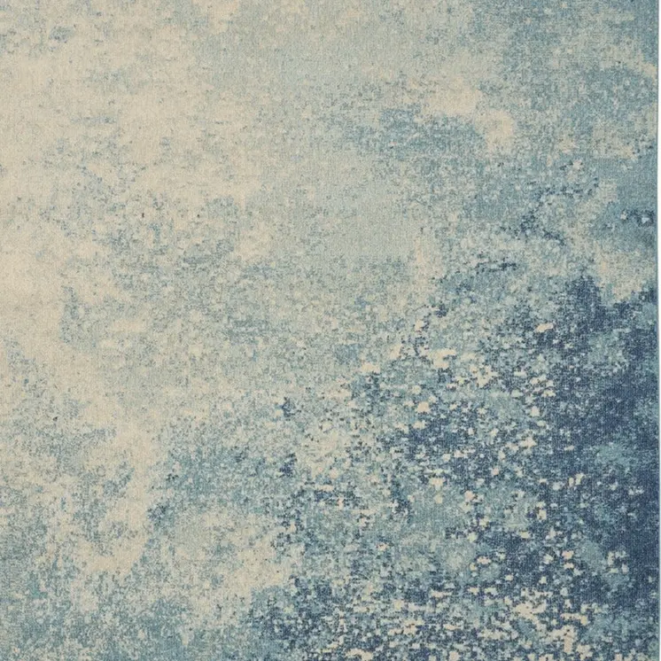 7' X 10' Blue And Ivory Abstract Area Rug