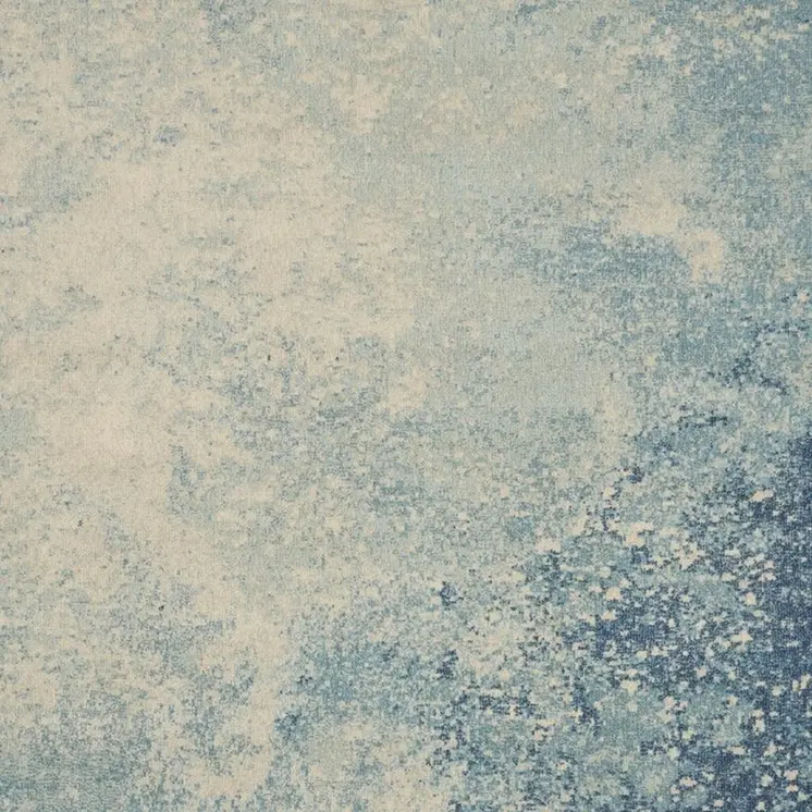 7' X 10' Blue And Ivory Abstract Area Rug