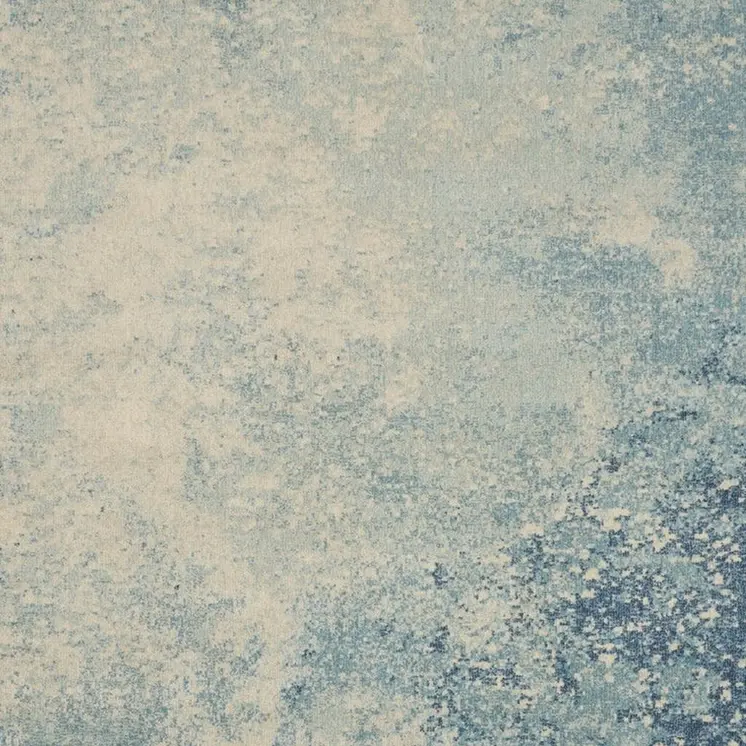7' X 10' Blue And Ivory Abstract Area Rug