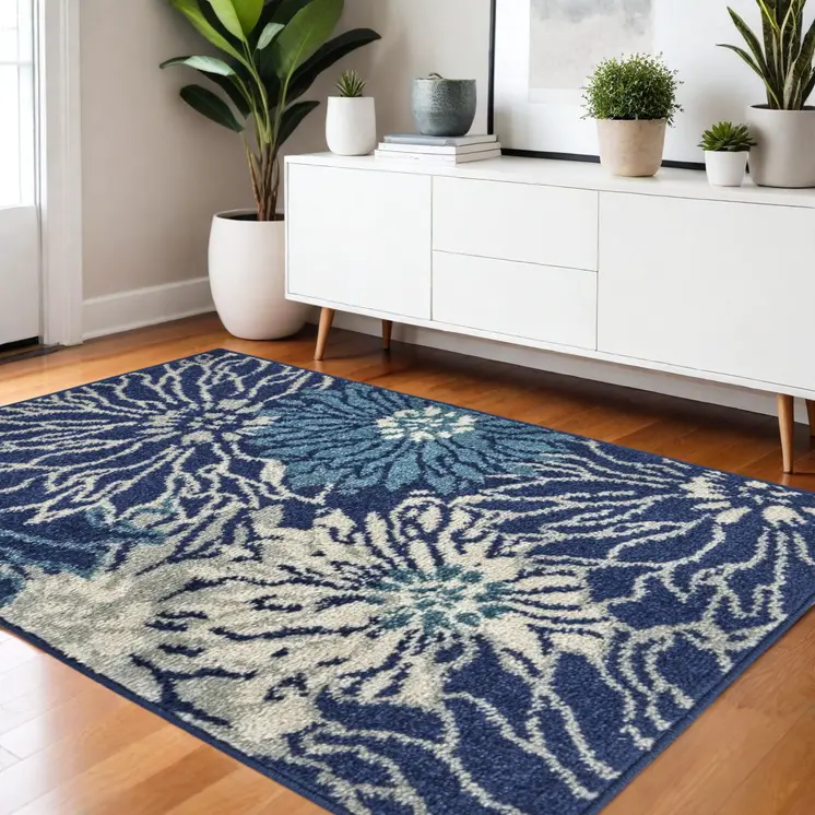 4' X 6' Blue And Ivory Floral Area Rug