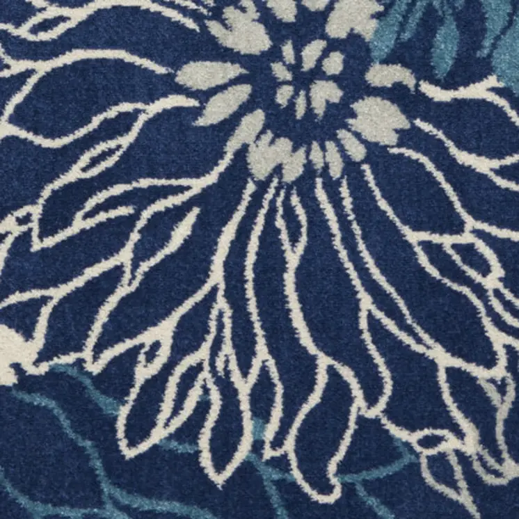 5' X 7' Blue And Ivory Floral Area Rug