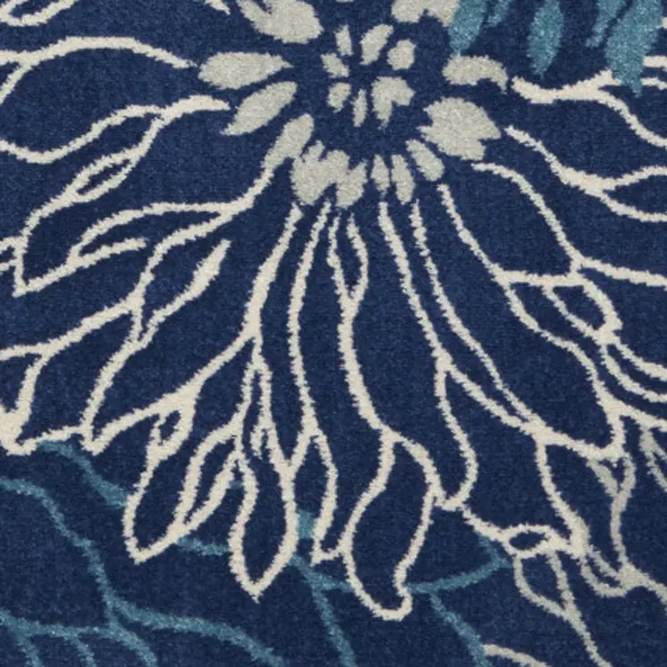 5' X 7' Blue And Ivory Floral Area Rug