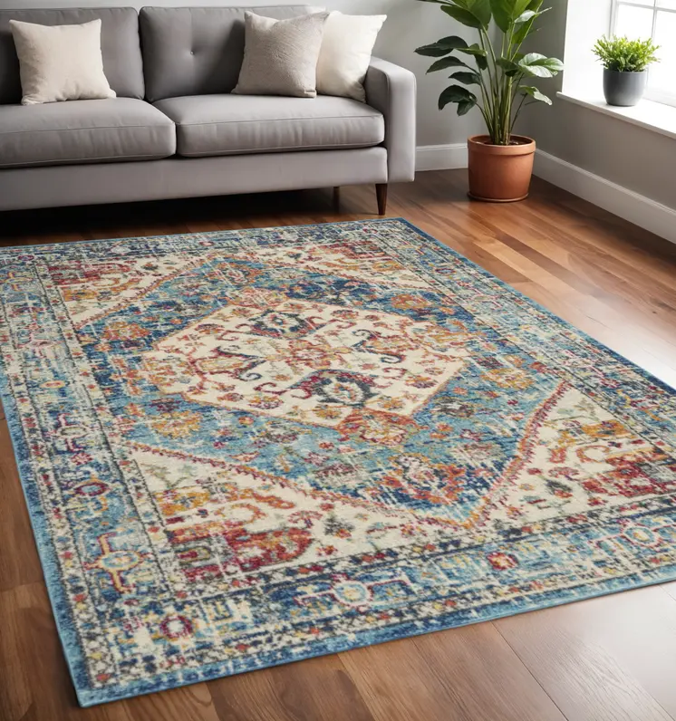 5' X 7' Ivory And Blue Oriental Distressed Area Rug