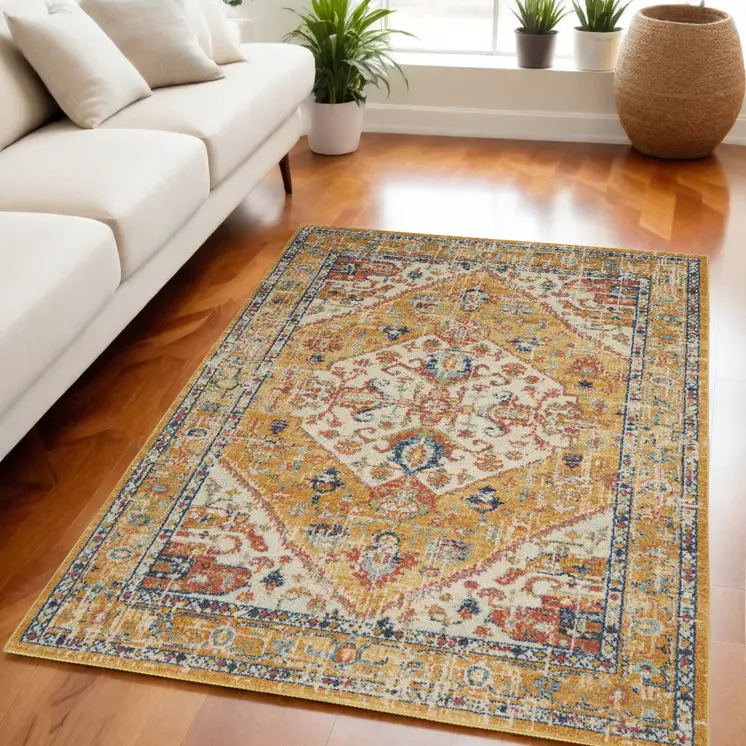 5' X 7' Yellow And Ivory Floral Medallion Area Rug