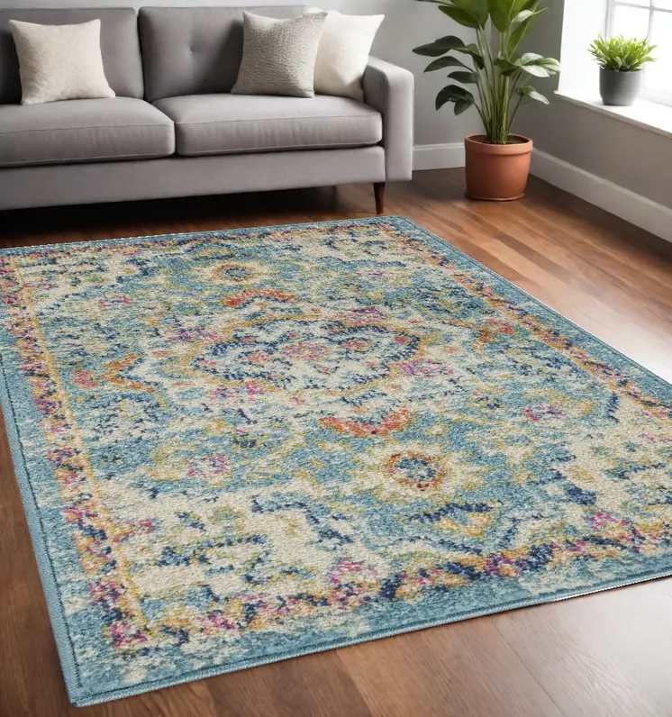5' X 7' Ivory And Blue Oriental Distressed Area Rug
