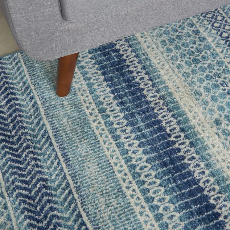 5' X 7' Navy Blue And Ivory Southwestern Area Rug