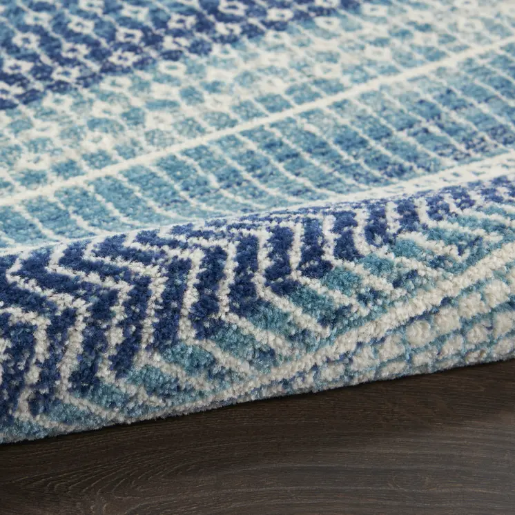 7' X 10' Navy Blue And Ivory Southwestern Area Rug