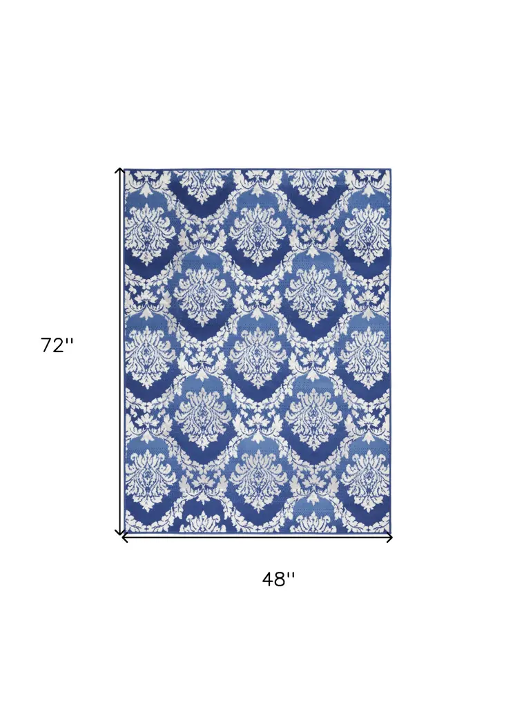 4' X 6' Blue And Ivory Damask Distressed Area Rug