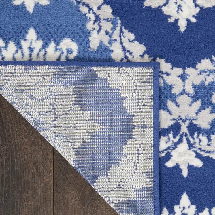 5' X 7' Blue And Ivory Damask Distressed Area Rug