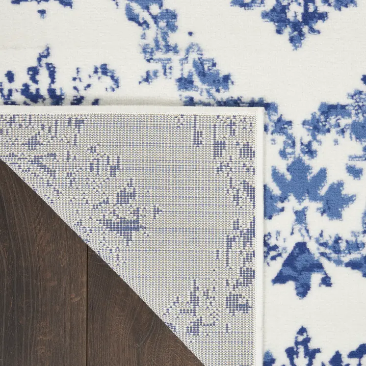6' X 9' Ivory And Blue Damask Distressed Area Rug