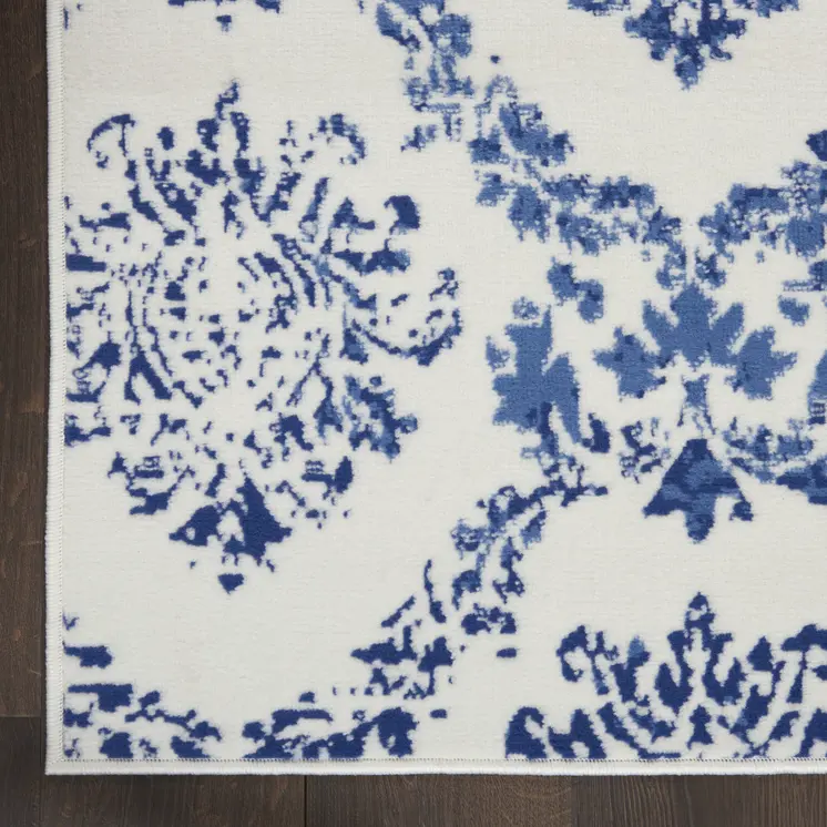 6' X 9' Ivory And Blue Damask Distressed Area Rug