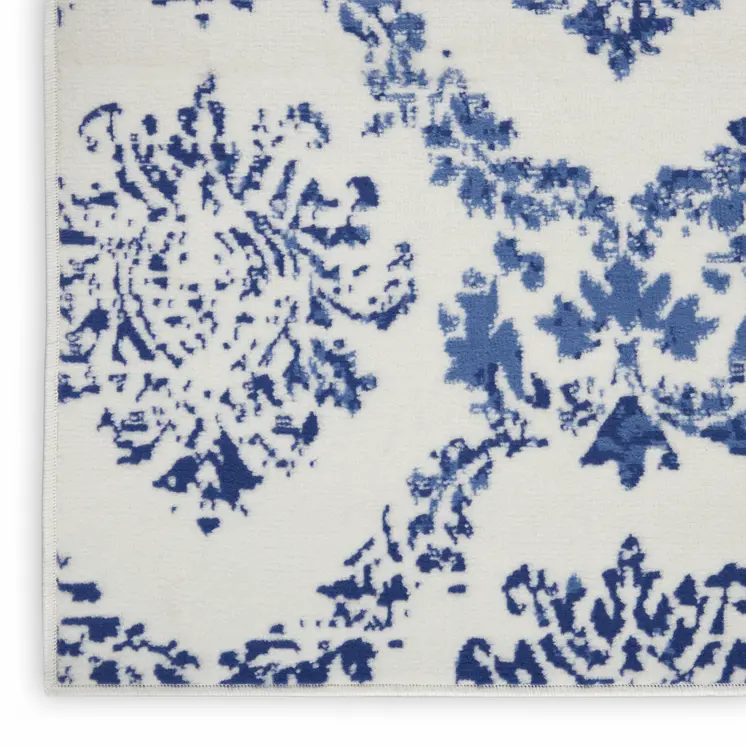 6' X 9' Ivory And Blue Damask Distressed Area Rug