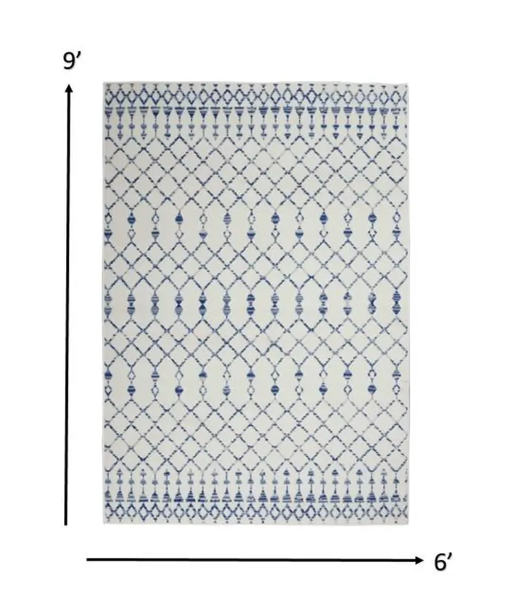 6' X 9' Ivory And Blue Geometric Area Rug