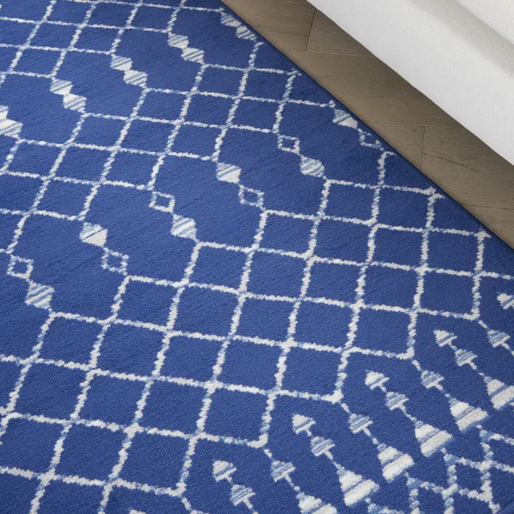 6' X 9' Ivory And Blue Geometric Area Rug