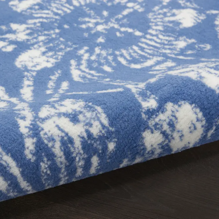 5' X 7' Blue And Ivory Floral Vines Distressed Area Rug
