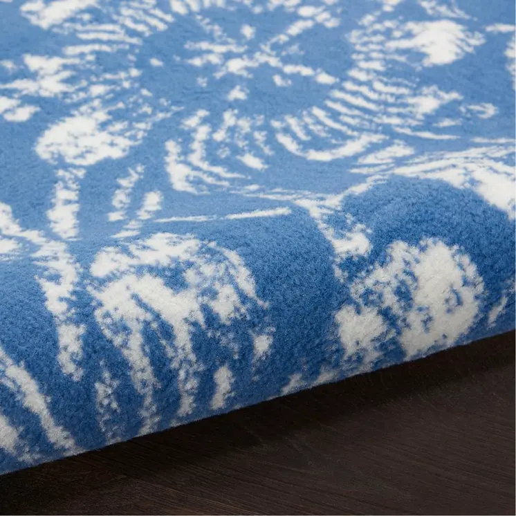 5' X 7' Blue And Ivory Floral Vines Distressed Area Rug