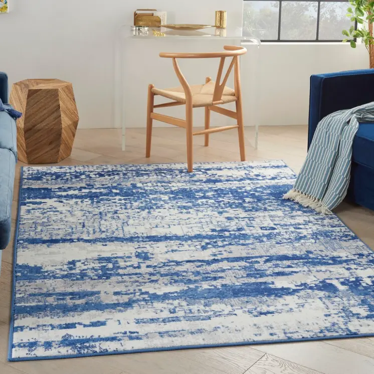 5' X 7' Ivory And Blue Ombre Distressed Area Rug