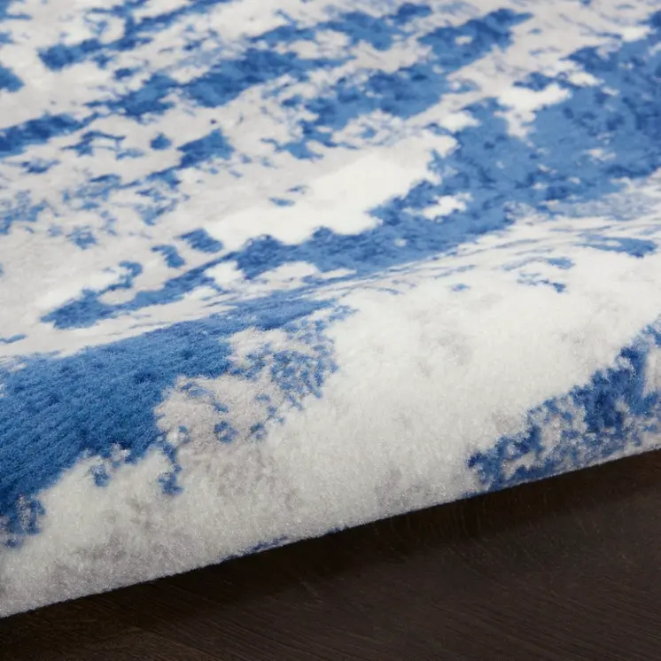 5' X 7' Ivory And Blue Ombre Distressed Area Rug