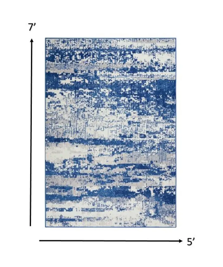 5' X 7' Ivory And Blue Ombre Distressed Area Rug