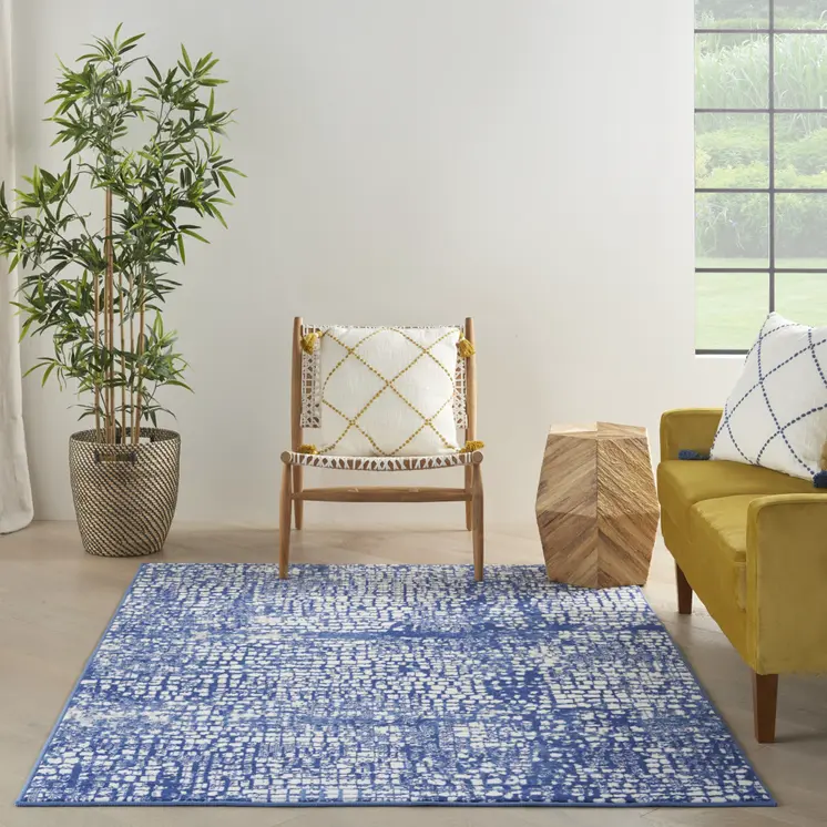 6' X 9' Ivory And Blue Geometric Area Rug