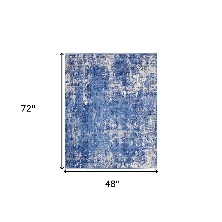 4' X 6' Blue And Ivory Abstract Distressed Area Rug