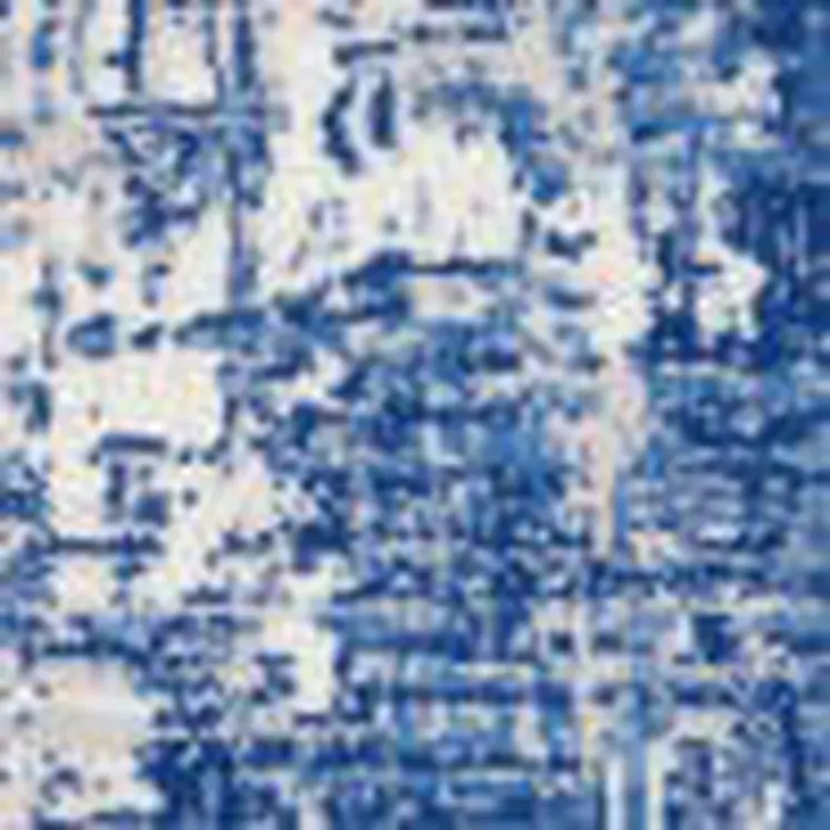 5' X 7' Blue And Ivory Abstract Distressed Area Rug