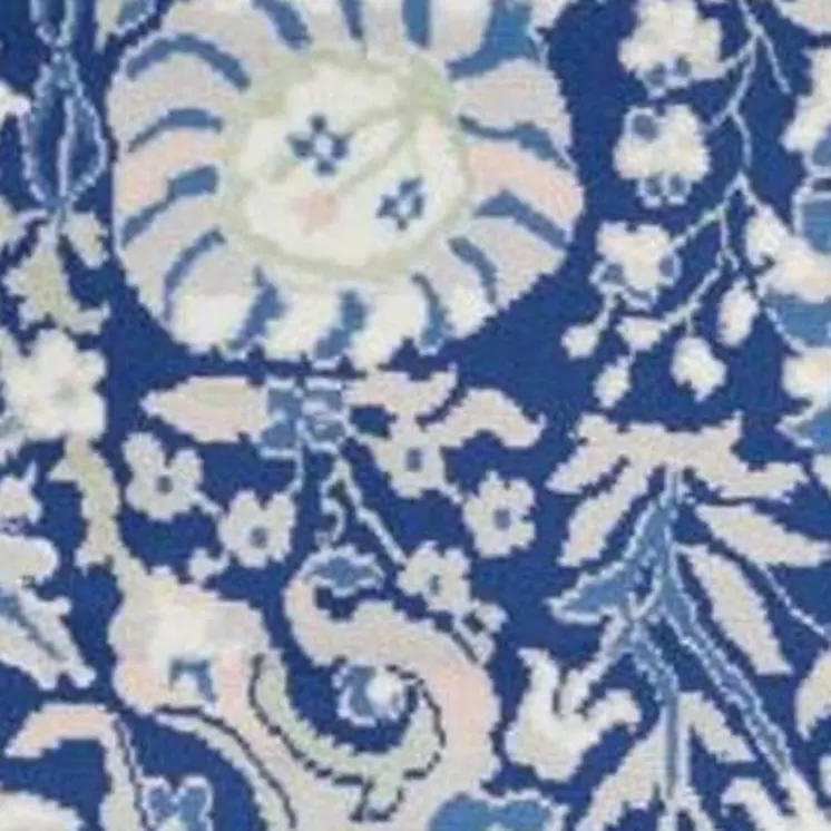 5' X 7' Ivory And Blue Floral Area Rug